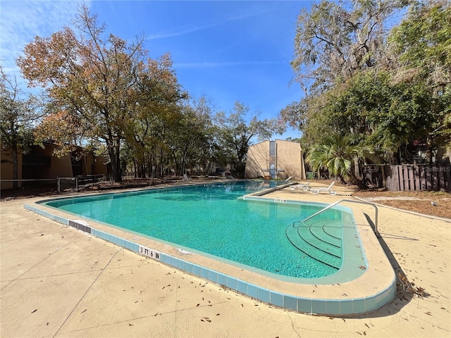 view of pool featuring a patio area