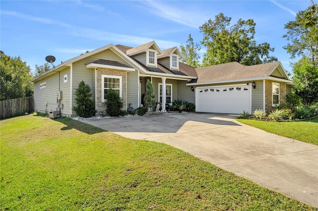 view of front of house featuring a garage and a front lawn