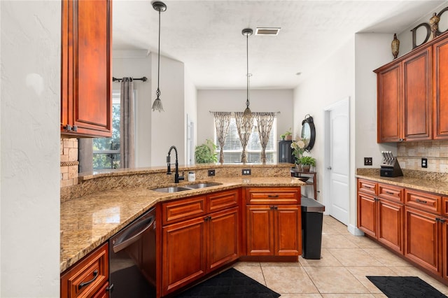 kitchen with dishwasher, sink, hanging light fixtures, and plenty of natural light