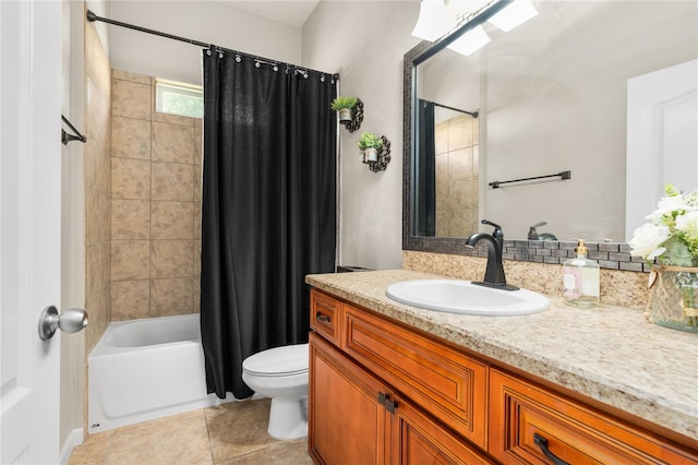 full bathroom with toilet, vanity, tile patterned floors, and shower / tub combo