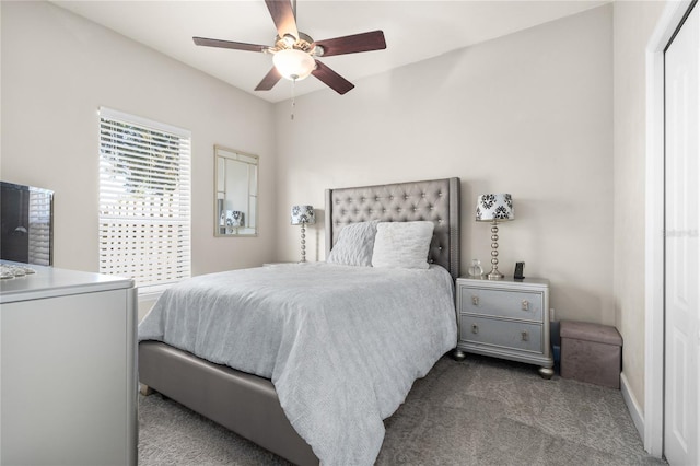 bedroom featuring ceiling fan and carpet flooring