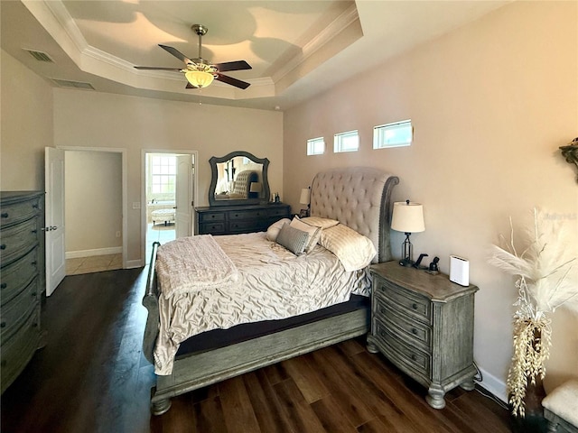 14825 NW 151st Ln, Alachua, FL 32615 - bedroom featuring a raised ceiling, dark wood finished floors, crown molding, and ceiling fan