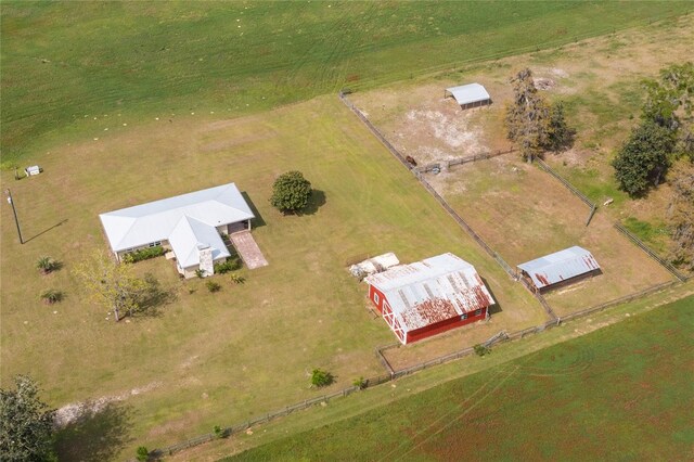 birds eye view of property featuring a rural view