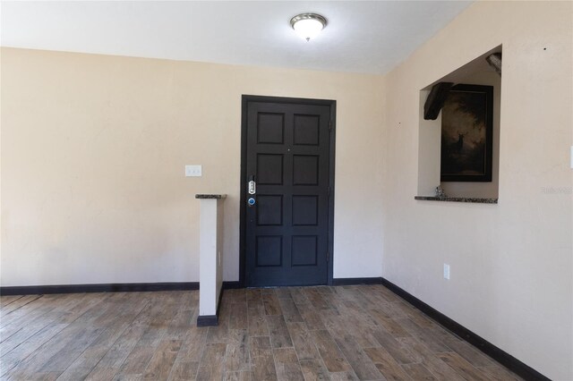 entrance foyer with dark hardwood / wood-style flooring