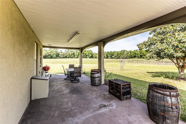 view of patio / terrace featuring a rural view