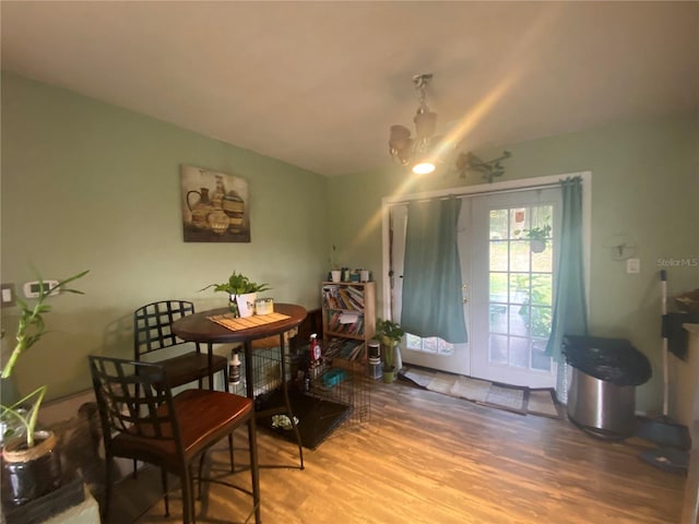 dining area with wood-type flooring