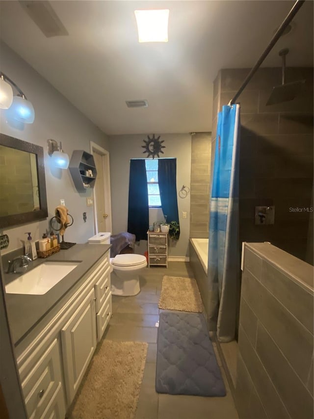 full bathroom featuring toilet, shower / tub combo with curtain, vanity, and hardwood / wood-style floors