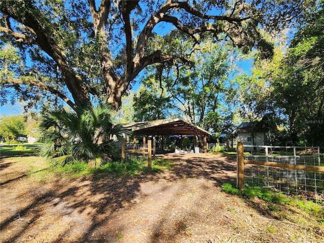 view of yard with a carport