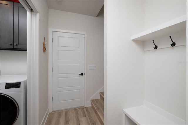 washroom with washer / clothes dryer and light hardwood / wood-style flooring