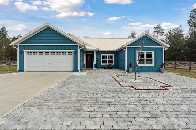 ranch-style home with a garage