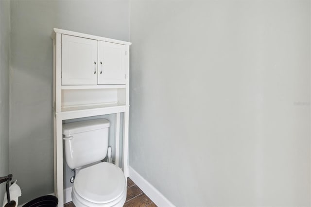 bathroom featuring toilet and hardwood / wood-style floors