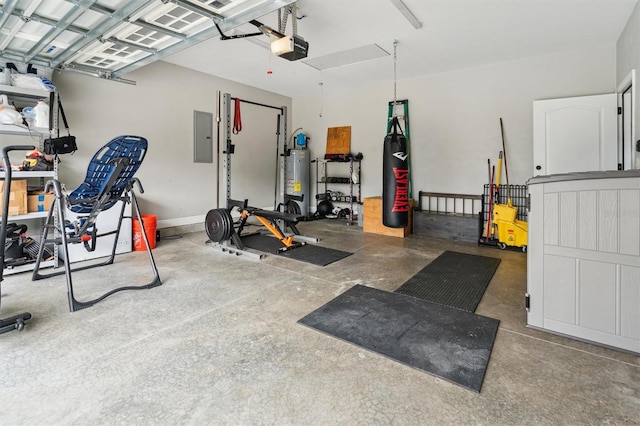 workout area featuring concrete floors, water heater, and electric panel