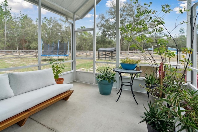 sunroom with vaulted ceiling