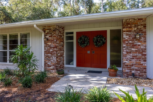 entrance to property with a porch