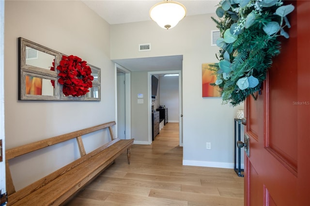 foyer entrance featuring light hardwood / wood-style floors