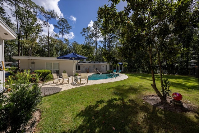 exterior space with a lawn and a patio