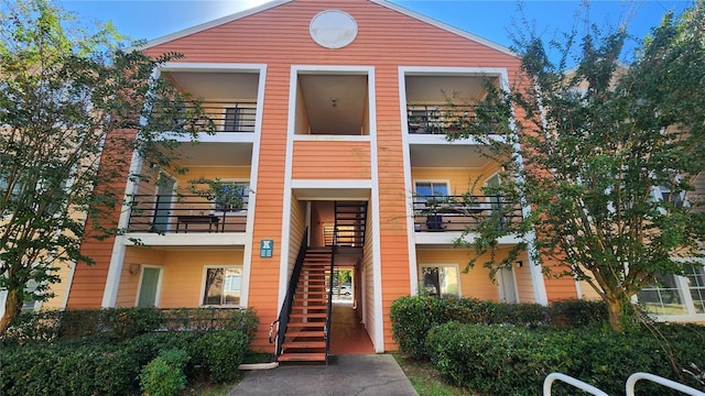 view of front facade featuring stairs