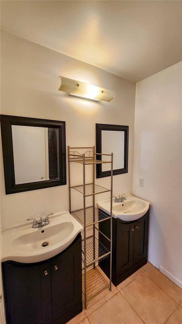 bathroom with vanity and tile patterned flooring