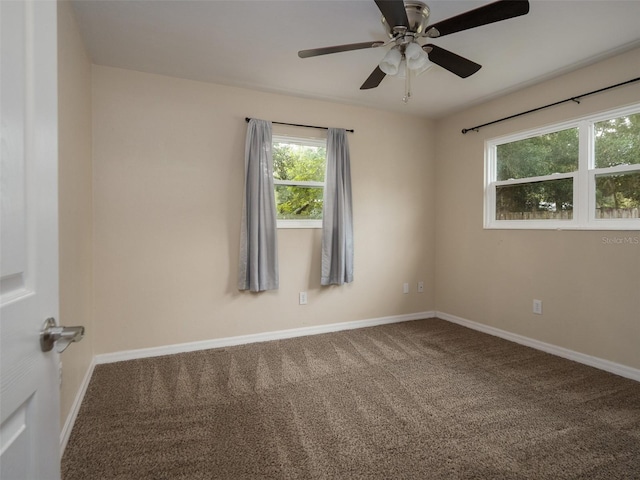 carpeted empty room with ceiling fan