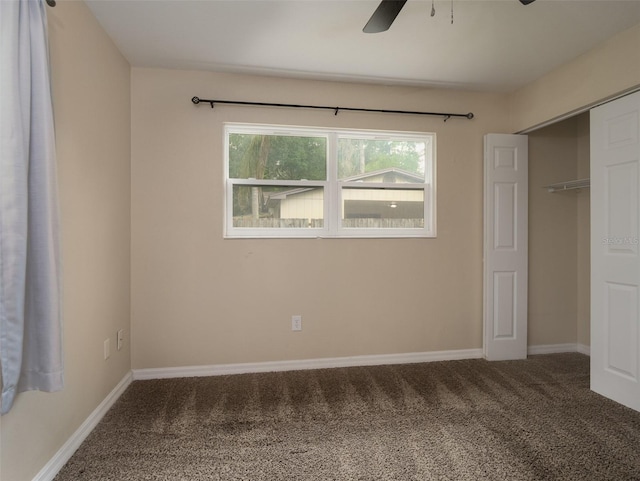 unfurnished bedroom featuring a closet, ceiling fan, and carpet flooring