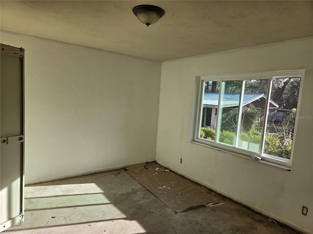 spare room with a wealth of natural light