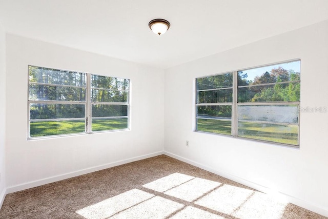 empty room with carpet floors