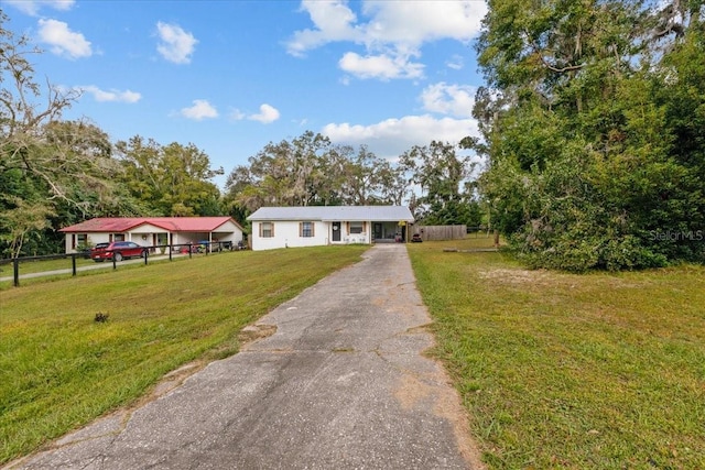 view of front of home with a front lawn