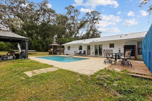 view of pool featuring a gazebo, a yard, and a patio