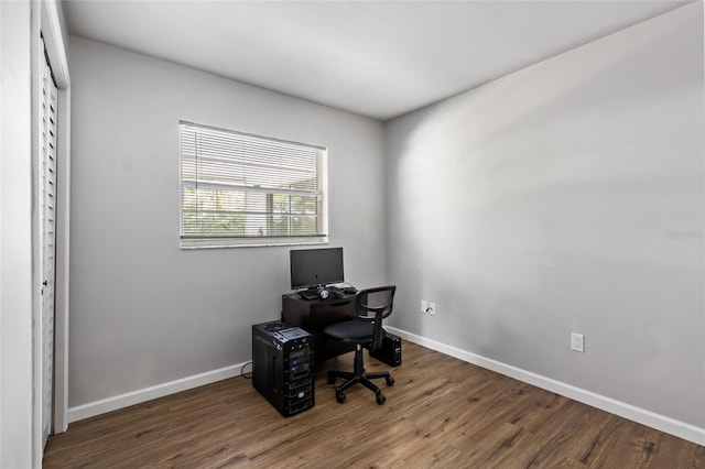 home office featuring dark hardwood / wood-style floors