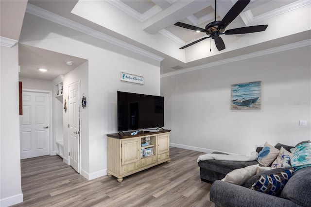 living room featuring crown molding, light hardwood / wood-style floors, and ceiling fan