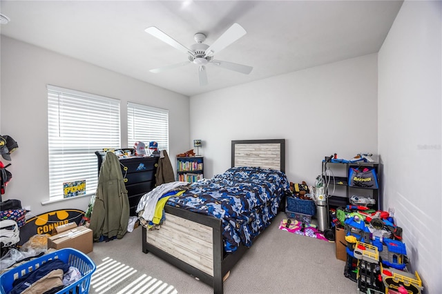 carpeted bedroom with ceiling fan