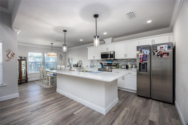 kitchen featuring a kitchen island with sink, white cabinetry, stainless steel appliances, and dark hardwood / wood-style floors