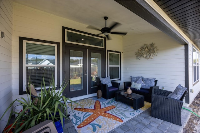 view of patio with french doors, ceiling fan, and an outdoor living space