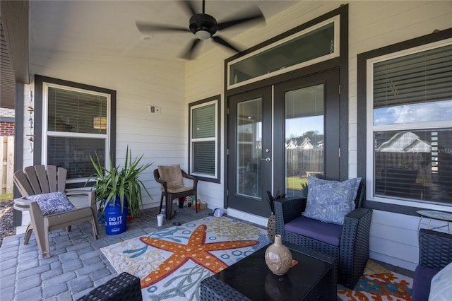 view of patio featuring ceiling fan