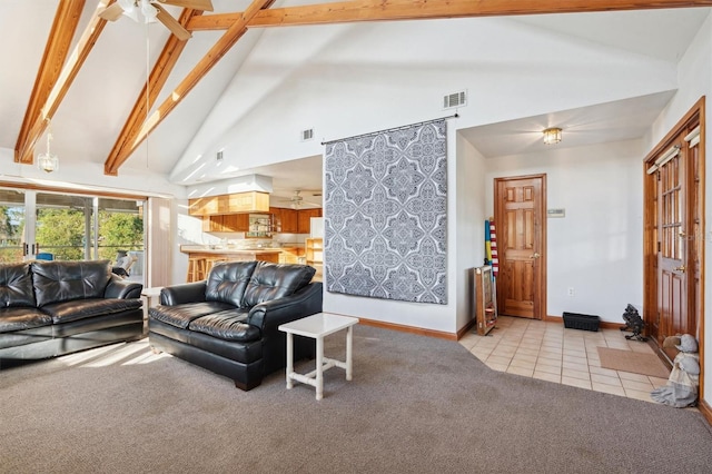 tiled living room featuring beamed ceiling, high vaulted ceiling, and ceiling fan