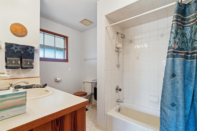 full bathroom with vanity, toilet, shower / bathtub combination with curtain, and tile patterned floors