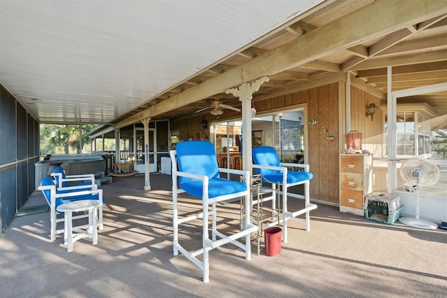 view of patio featuring a hot tub and ceiling fan