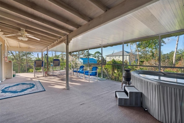 exterior space featuring a hot tub and ceiling fan