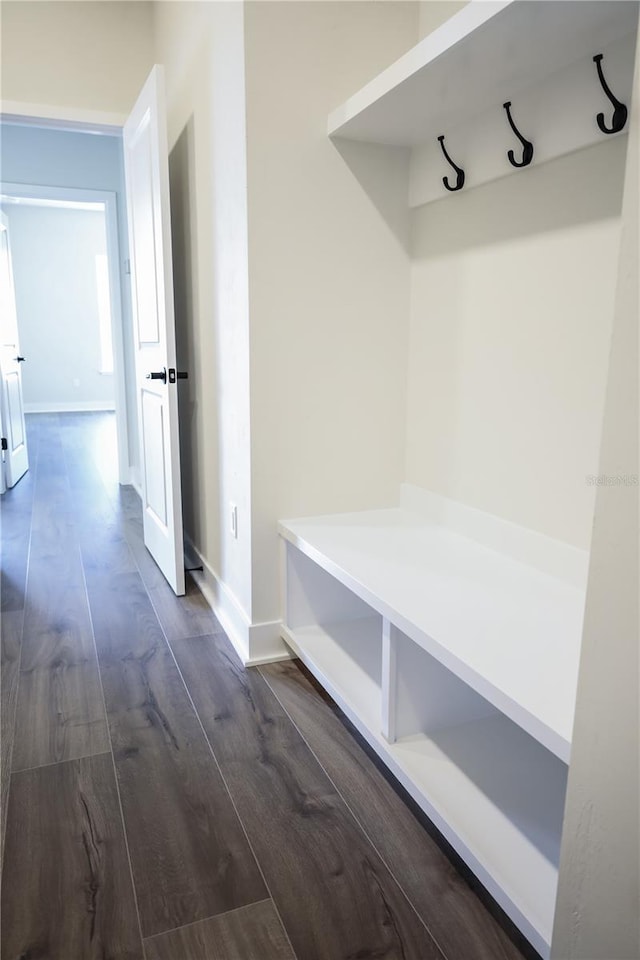 840 SW 144th Dr, Newberry, FL 32669 - mudroom featuring dark wood-style flooring and baseboards