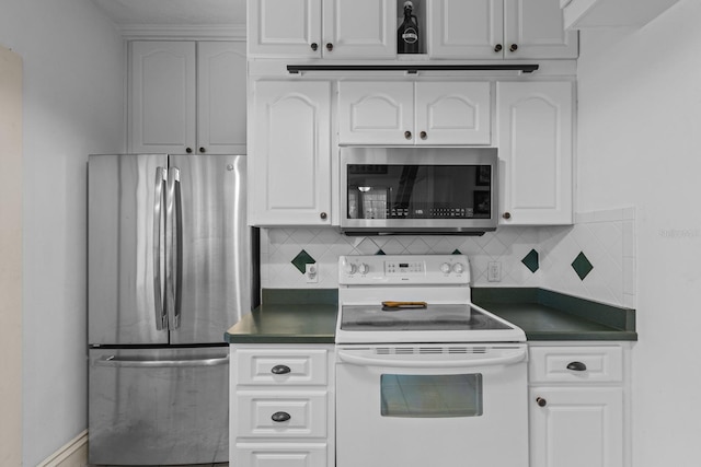 kitchen with white cabinetry, stainless steel appliances, and decorative backsplash