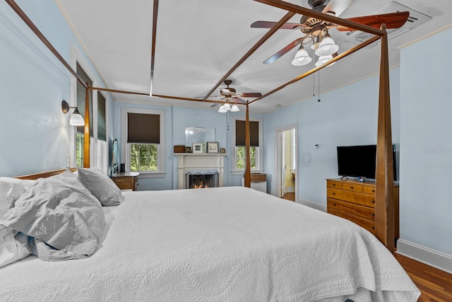 bedroom featuring dark hardwood / wood-style flooring