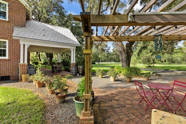 view of patio with a gazebo and a pergola