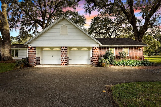 view of front of property featuring a garage