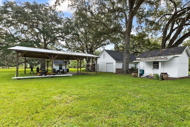 view of yard featuring a gazebo and an outdoor structure