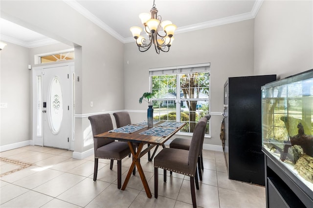 dining room featuring a notable chandelier, light tile patterned flooring, and crown molding