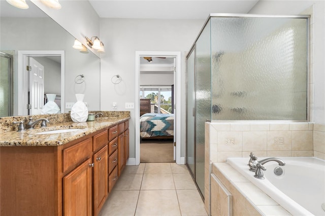 bathroom with vanity, separate shower and tub, and tile patterned flooring