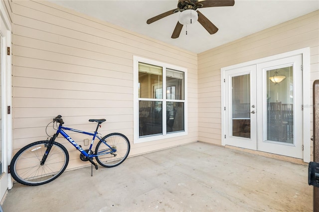 view of patio with french doors and ceiling fan