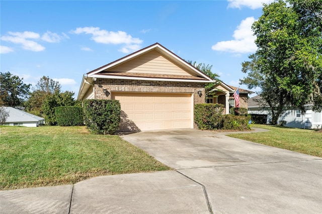 view of front of home featuring a front lawn and a garage