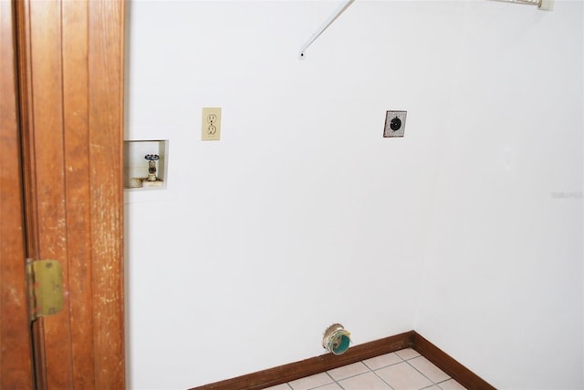 laundry room featuring hookup for an electric dryer, washer hookup, and light tile patterned flooring