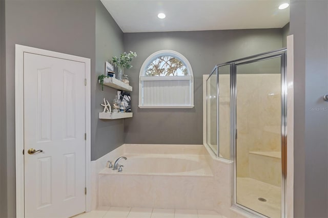 6225 NW 105th Ave, Alachua, FL 32615 - bathroom featuring a bath, a shower stall, tile patterned flooring, and recessed lighting